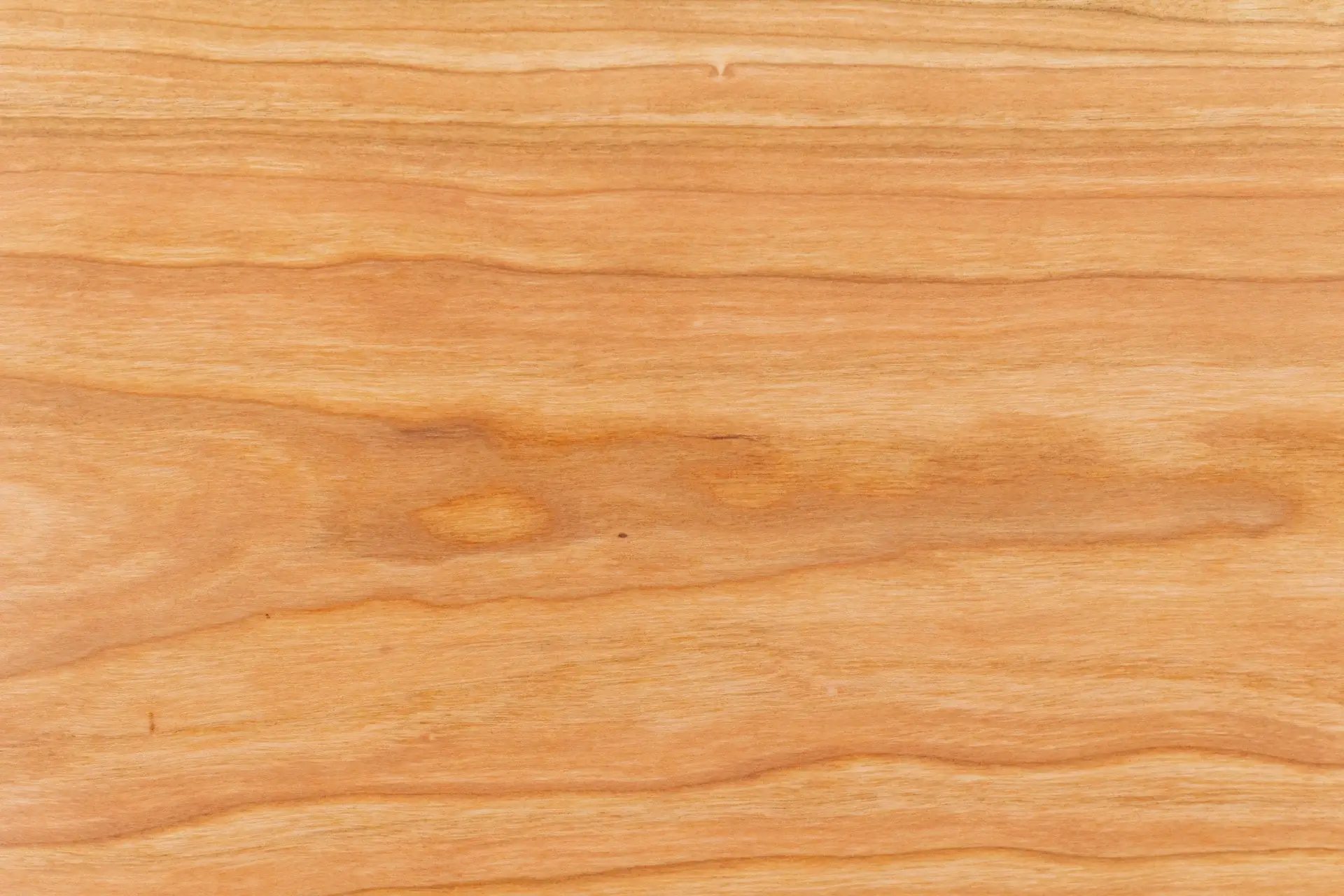 Smooth wooden surface with natural grain patterns.