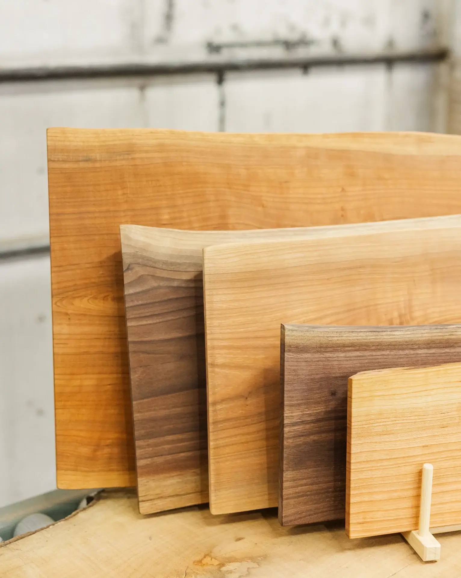 Various wooden boards of different sizes and types.