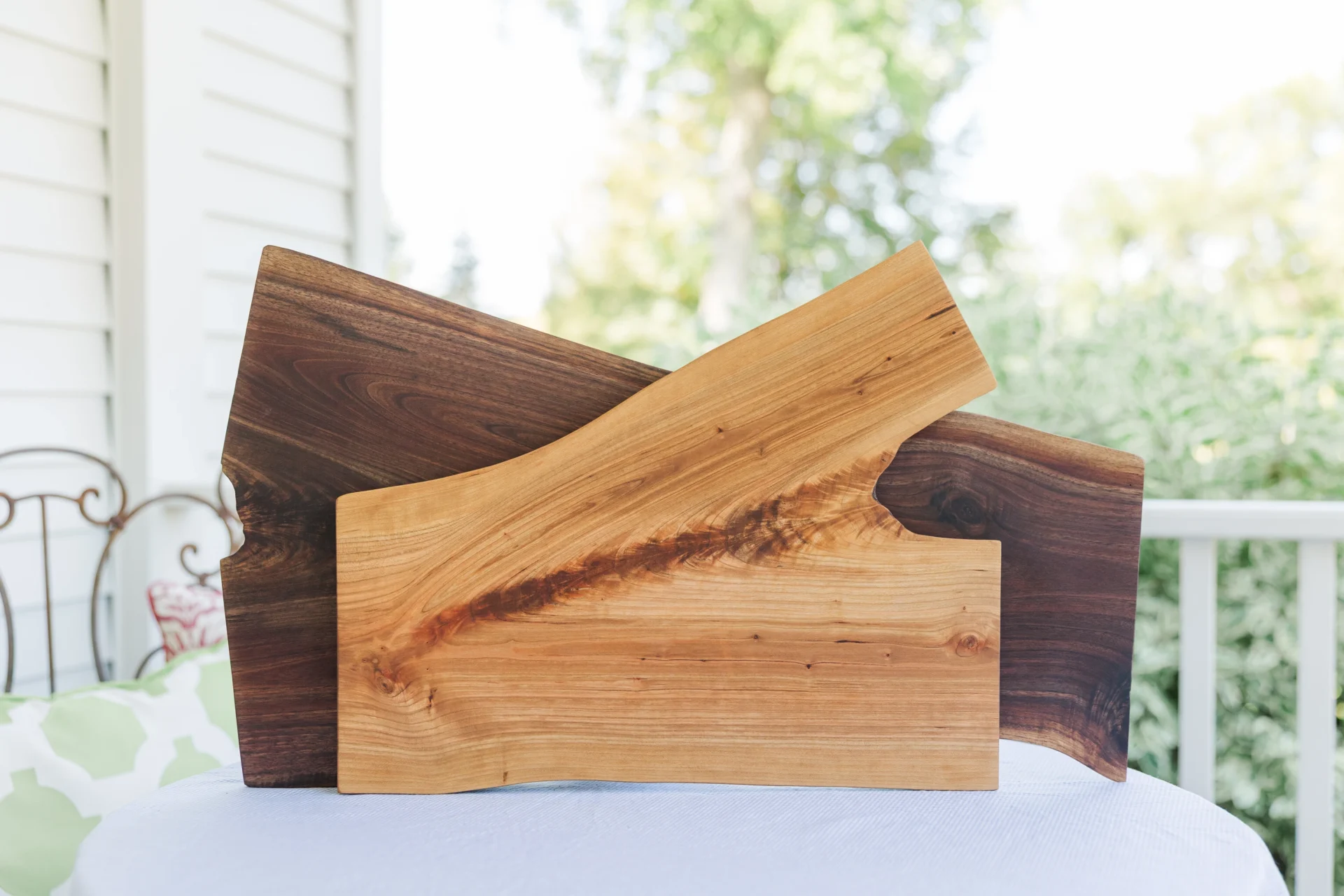 A piece of wood with a smooth, natural finish and unique grain patterns.